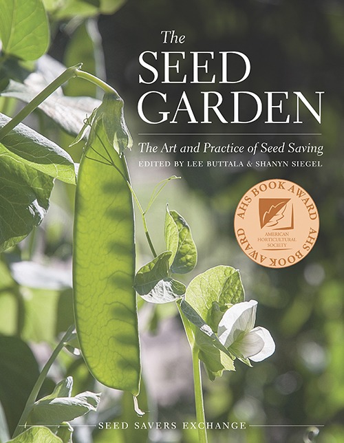 Book cover of 'The Seed Garden', featuring a green pea pod growing next to a white pea flower, with text "The Seed Garden: The Art and Practice of Seed Saving. Edited by Lee Buttala & Shanyn Siegel. Seed Savers Exchange" and an AHS Book Award seal