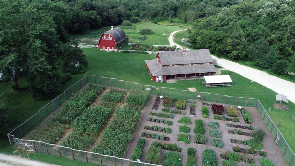 Arial photo of Heritage Farm gardens, and two buildings.