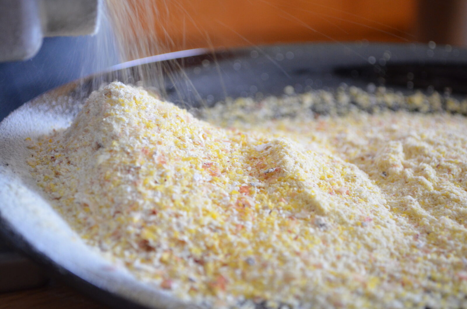 A bowl of ground up corn kernels