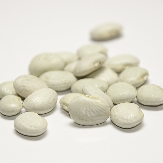 A cluster of white lima beans